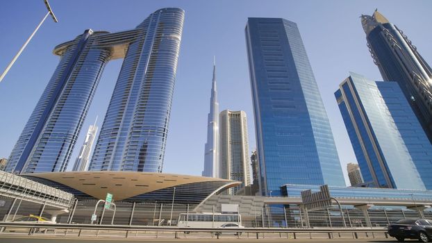 Tall and modern skyscrapers of Dubai on a sunny day