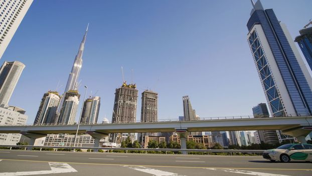 Tall and modern skyscrapers of Dubai on a sunny day