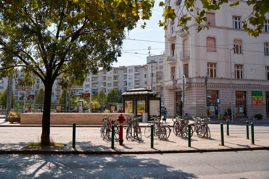 Bicycle parking on the street of a modern European city. Budapest, Hungary - 08.25.2022