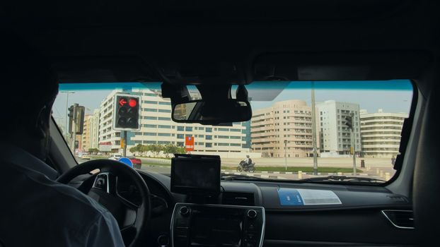 View from the cab of a car taxi to the streets of Dubai