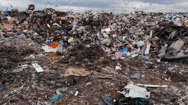 Large landfill near the metropolis in autumn