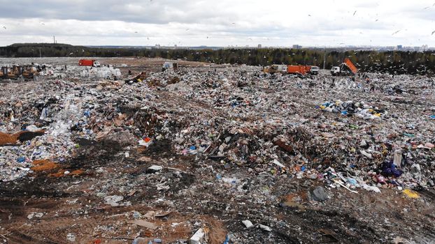 Large landfill near the metropolis in autumn