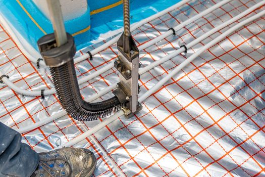 stapler for underfloor heating pipes.