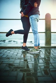 Caught up in the moment. a young couple embracing on a romantic day outdoors