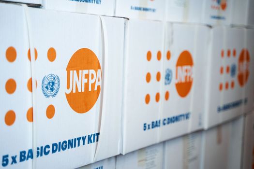 Boxes with humanitarian aid for temporary moved Ukrainian people on the warehouse. Dnipro, Ukraine - 06.28.2022