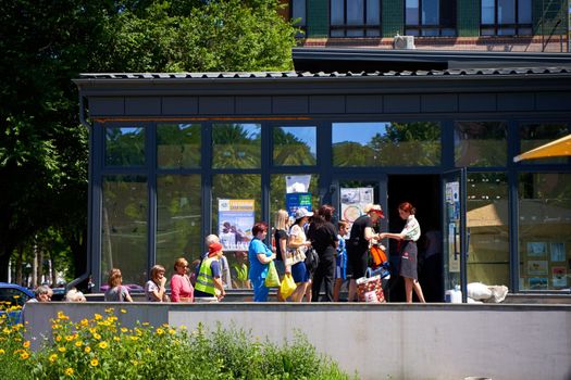 queue to the canteen for free food for temporarily displaced residents of Ukraine. Dnipro, Ukraine - 06.28.2022