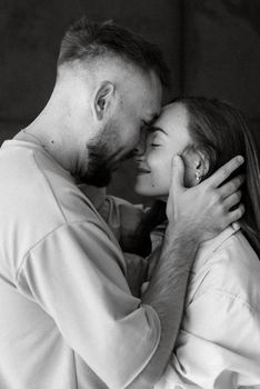 earlier morning bride and groom at home in bed