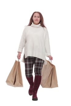 full-length. casual woman with shopping bags .isolated on a white background.