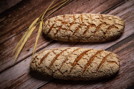 Rye bread on brown background. High quality photo