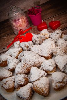 Recipe for soft heart-shaped doughnuts for Valentine's Day. High quality photo