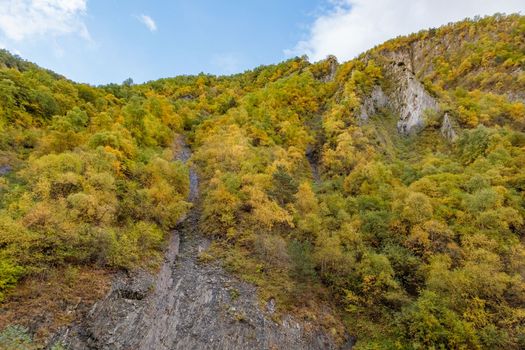 Highlands of North Ossetia. Mountains of the Caucasus. High mountains in the rays of the setting sun