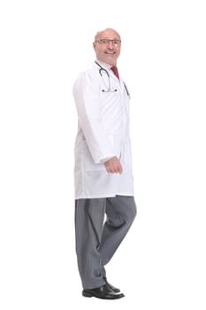 Old male doctor walking away and look away isolated on white. Concept of health care