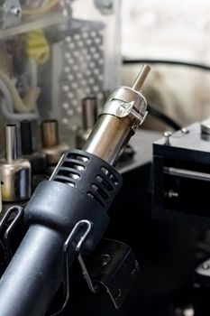 Black soldering dryer and soldering station close up