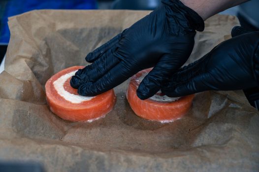 Preparing of salmon roll with mozzarella. Semi-finished dish