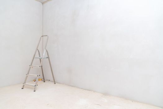folding ladder on construction site.