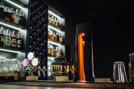 Bar counter with draught beer in a beer restaurant.
