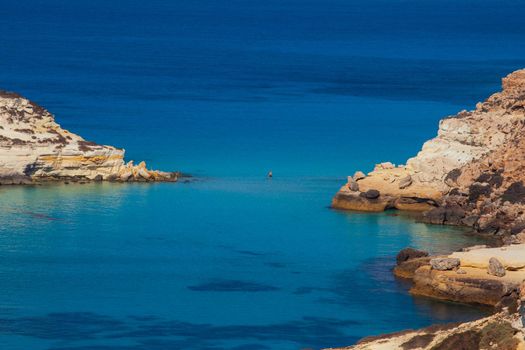 View of the most famous sea place of Lampedusa, It is named Spiaggia dei conigli, in English language Rabbits Beach or Conigli island