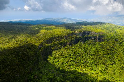 Bird's-eye view of the mountains and fields of the island of Mauritius.Landscapes Of Mauritius