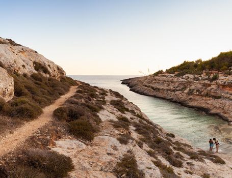 LAMPEDUSA, ITALY - JULY, 29: View of Cala Greca at sunset in the summer season on July 29, 2018