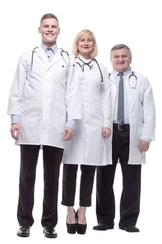 in full growth.qualified doctors colleagues standing in a row. isolated on a white background.