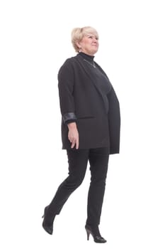 in full growth.confident business woman striding forward. isolated on a white background.