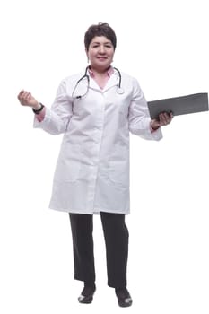 in full growth. smiling therapist with a clipboard. isolated on a white background