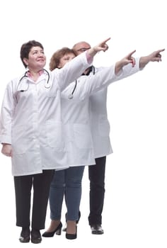 in full growth. group of medical colleagues standing in a row. isolated on a white background