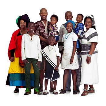 Were a happy family. Studio shot of a traditional african family isolated on white
