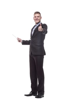 in full growth. happy young businessman with a digital tablet . isolated on a white background.