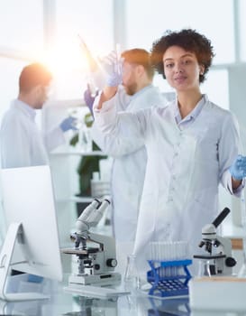 Scientists smiling together in lab