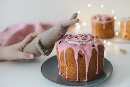 Easter cake, colorful eggs and rabbit toy. Happy Easter holiday concept. festive spring season.