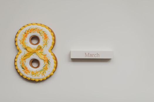 Women's Day, March 8, figure eight, gingerbread, flowers. space for text
