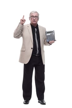 in full growth. Mature intelligent man with a calculator. isolated on a white background.