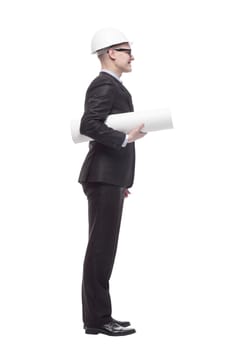 in full growth. young architect with drawings. isolated on a white background.