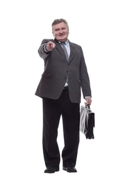 in full growth.Executive business man with a leather briefcase . isolated on a white background.