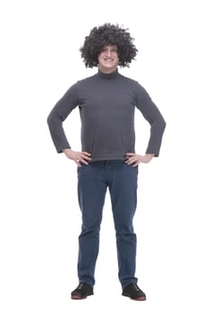 in full growth. Jolly young man in a curly wig. isolated on a white background.