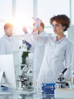 Scientists smiling together in lab