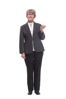 Middle age woman holding a gift standing over isolated white background very happy with hands up. Consept of joy from a gift