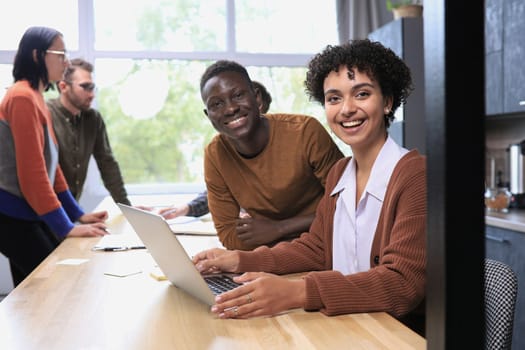 Group portrait of a professional business team looking confidently at camera