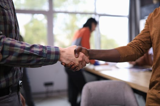 Close up view of business partnership handshake concept