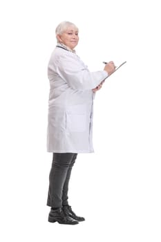 Profile side view portrait of mature doctor writing recommending filling medical form isolated over white background