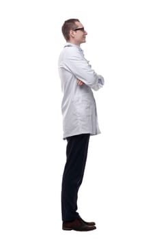 side view. confident young doctor looking forward. isolated on a white background.