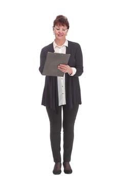 Portrait of mature business woman holding a clipboard and looking at camera