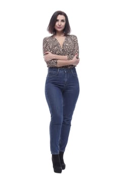 in full growth. an attractive young woman in jeans. isolated on a white background.