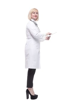 in full growth. qualified female doctor with a digital tablet. isolated on a white background.