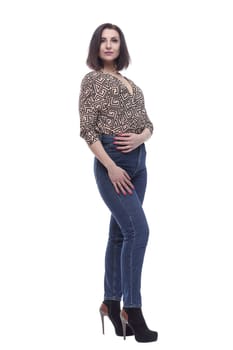 in full growth. an attractive young woman in jeans. isolated on a white background.