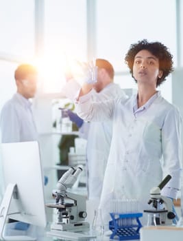 Scientists smiling together in lab