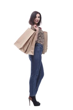 attractive young woman with shopping bags. isolated on a white background.