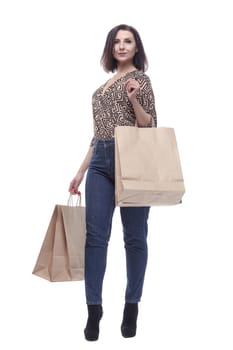 attractive young woman with shopping bags. isolated on a white background.