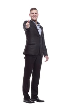 in full growth. handsome young businessman. isolated on a white background.